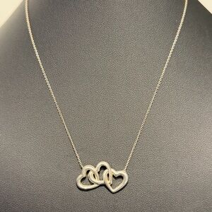 Tiffany & Co. “Three Interlocking Hearts” Necklace in Sterling Silver